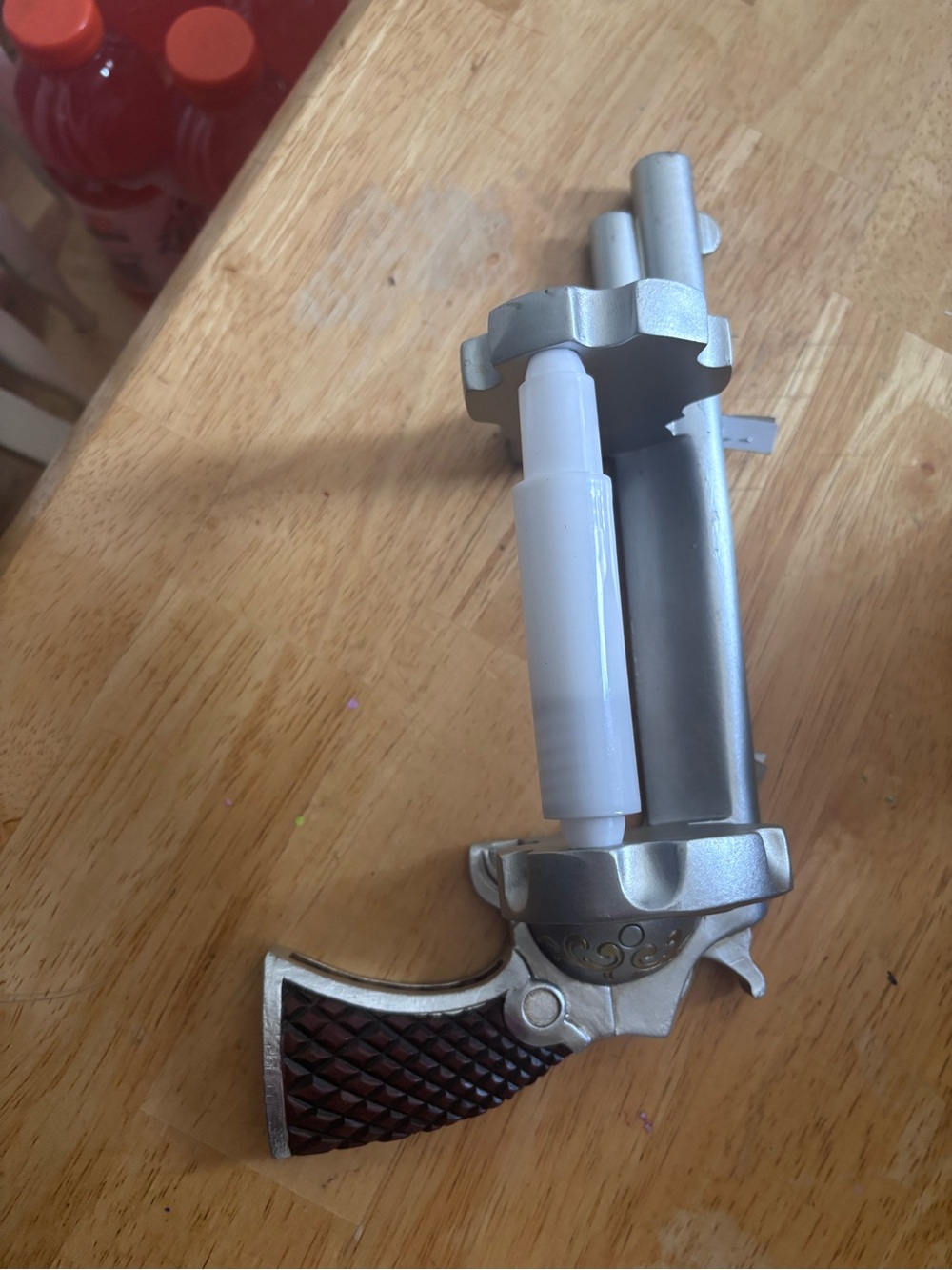 Silver and Brown Revolver-Style Novelty Accessory -toilet paper holder